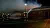 Großfeuer in Nordfriesland: Feuerwehrhaus und Lagergebäude lichterloh in Flammen: Zunächst war ein brennender Schuppen gemeldet worden - Flammen griffen schnell um sich - Feuerwehr kann Fahrzeuge und Ausrüstung noch retten - Gebäude wird von Bagger eingerissen